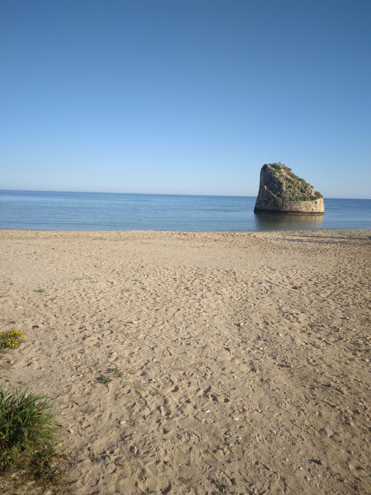 Spiaggia di Torre Pali e torre costiera